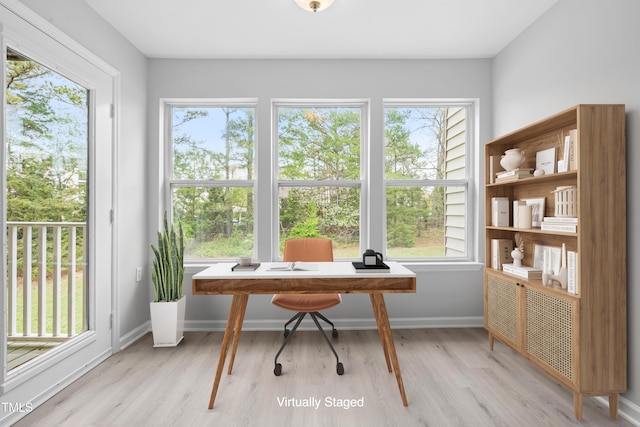1300 Hillbrow Ln Unit 204, Raleigh, NC 27615 - home office featuring plenty of natural light and light wood-type flooring