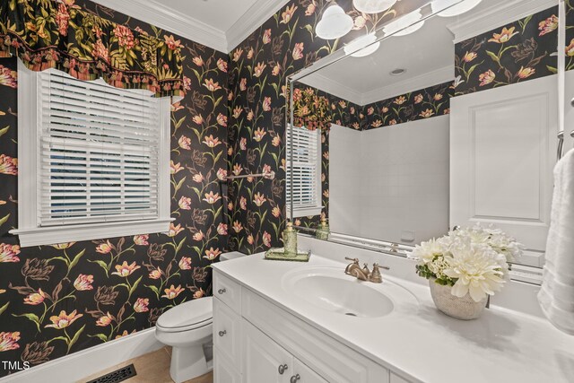 half bathroom with wallpapered walls, crown molding, vanity, toilet, and baseboards