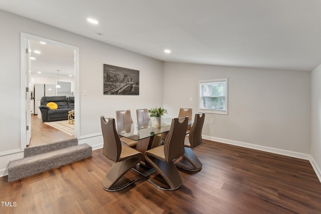 dining space featuring baseboards, recessed lighting, and wood finished floors