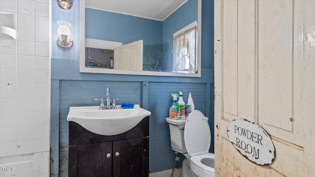 410 Halifax St, Warrenton, NC 27589 - bathroom with vanity and toilet
