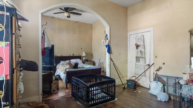 410 Halifax St, Warrenton, NC 27589 - bedroom with hardwood / wood-style floors and arched walkways