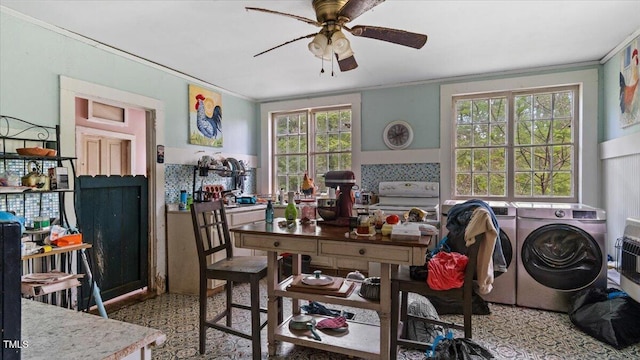 410 Halifax St, Warrenton, NC 27589 - interior space featuring independent washer and dryer, crown molding, and ceiling fan