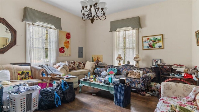 410 Halifax St, Warrenton, NC 27589 - living area with a notable chandelier, wood finished floors, and electric panel