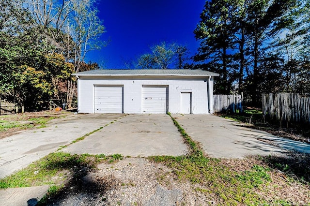 detached garage with fence