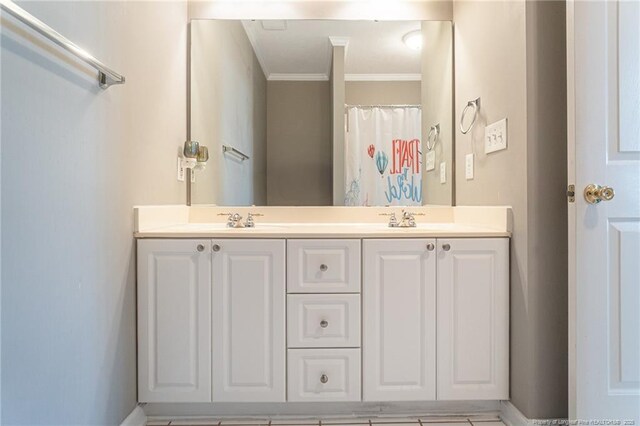 3159 Wisteria Ln Unit 101, Fayetteville, NC 28314 - bathroom featuring double vanity, a sink, and crown molding