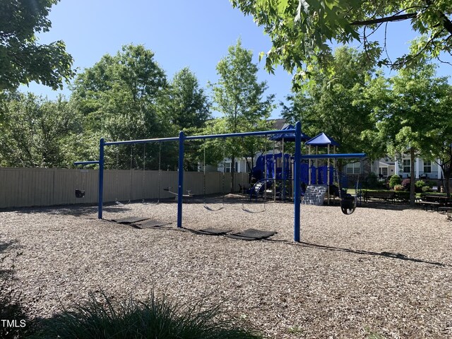 community playground featuring fence