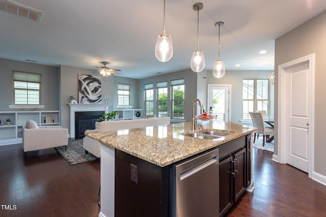4026 Overcup Oak Ln, Cary, NC 27519 - kitchen with stainless steel dishwasher, a sink, dark wood-style flooring, decorative light fixtures, and ceiling fan