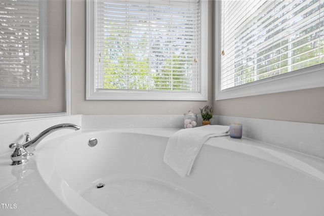 full bathroom featuring a garden tub