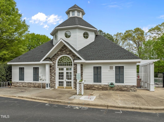 view of property with fence