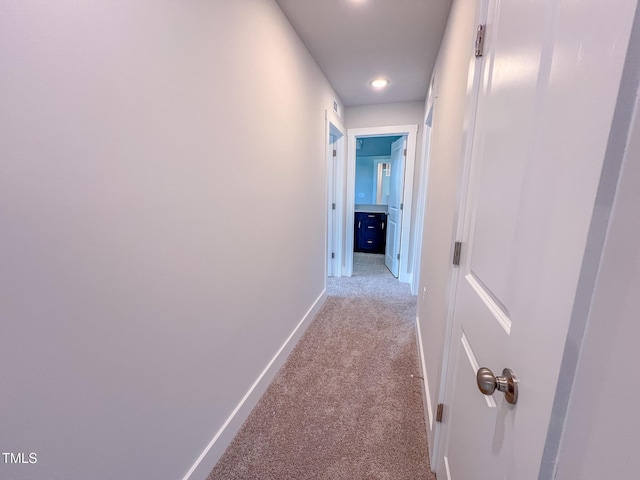 217 Duncan Creek Rd # 124, Lillington, NC 27546 - hallway with light colored carpet, baseboards, and recessed lighting