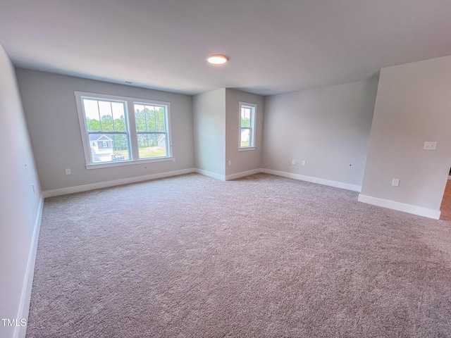 217 Duncan Creek Rd # 124, Lillington, NC 27546 - spare room with baseboards and carpet