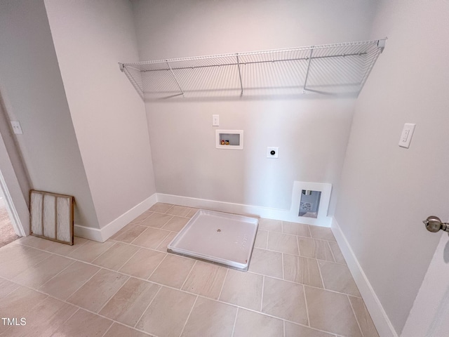 217 Duncan Creek Rd # 124, Lillington, NC 27546 - washroom with electric dryer hookup, washer hookup, baseboards, and light tile patterned flooring