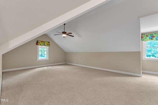 85 Christenbury Ln, Clayton, NC 27527 - additional living space featuring baseboards, light colored carpet, ceiling fan, and vaulted ceiling