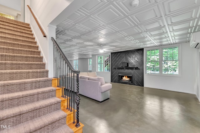 85 Christenbury Ln, Clayton, NC 27527 - living room featuring an ornate ceiling, a ceiling fan, concrete floors, and stairs