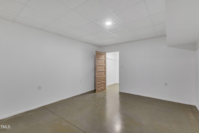 85 Christenbury Ln, Clayton, NC 27527 - unfurnished room with concrete flooring, baseboards, and a drop ceiling