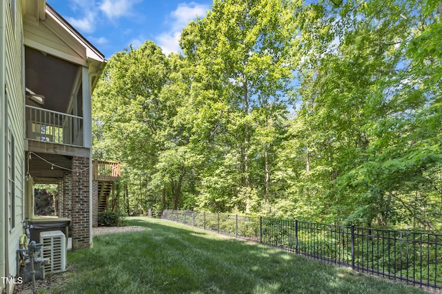 85 Christenbury Ln, Clayton, NC 27527 - view of yard featuring fence, stairs, and a sunroom