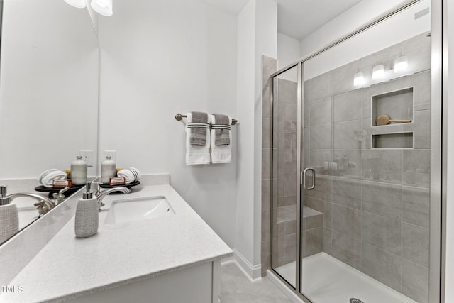 1245 S Blount St Unit 201, Raleigh, NC 27601 - bathroom featuring a stall shower and vanity