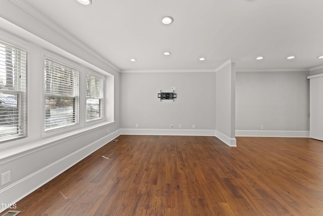 2949 Tram Rd, Fuquay Varina, NC 27526 - spare room with recessed lighting, ornamental molding, baseboards, and wood finished floors
