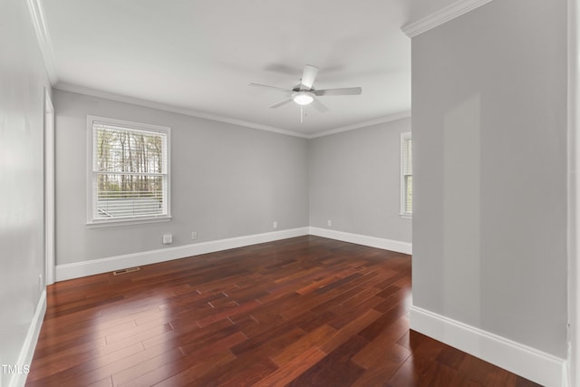2949 Tram Rd, Fuquay Varina, NC 27526 - empty room with dark wood-style flooring, ceiling fan, visible vents, and crown molding