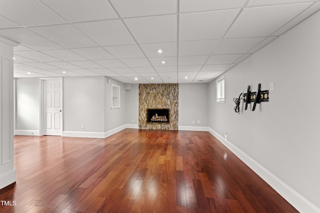 2949 Tram Rd, Fuquay Varina, NC 27526 - unfurnished living room featuring recessed lighting, baseboards, a fireplace, and wood finished floors