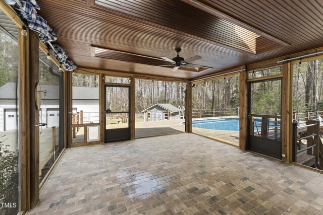 2949 Tram Rd, Fuquay Varina, NC 27526 - unfurnished sunroom with ceiling fan