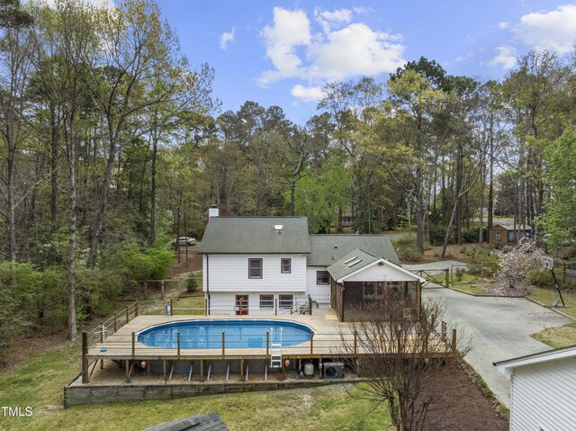 2949 Tram Rd, Fuquay Varina, NC 27526 - pool featuring fence and a deck