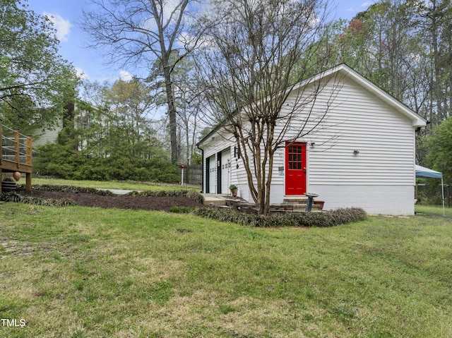 2949 Tram Rd, Fuquay Varina, NC 27526 - view of side of property with a lawn and a garage