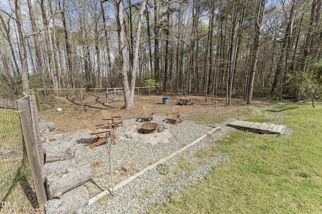 2949 Tram Rd, Fuquay Varina, NC 27526 - view of yard featuring a fire pit and fence