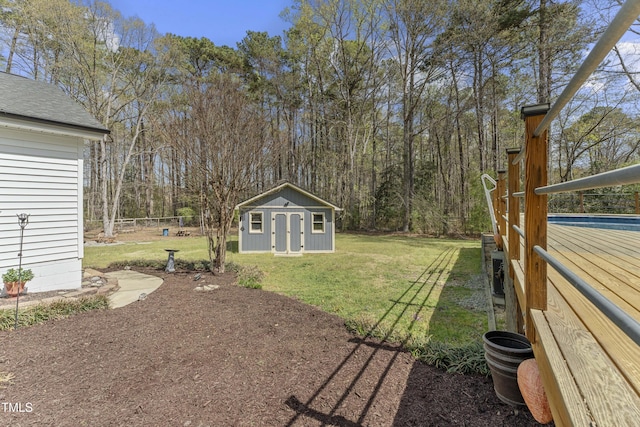 2949 Tram Rd, Fuquay Varina, NC 27526 - view of yard featuring an outbuilding and fence