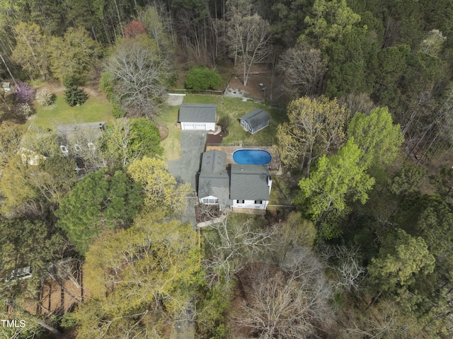 2949 Tram Rd, Fuquay Varina, NC 27526 - birds eye view of property with a wooded view