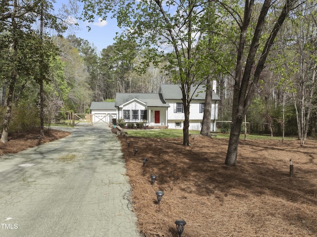 2949 Tram Rd, Fuquay Varina, NC 27526 - view of front of property featuring driveway and an attached garage
