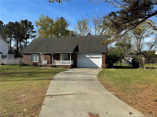 5870 Mcdonald Rd, Parkton, NC 28371 - ranch-style house with an attached garage, a front yard, brick siding, a porch, and driveway