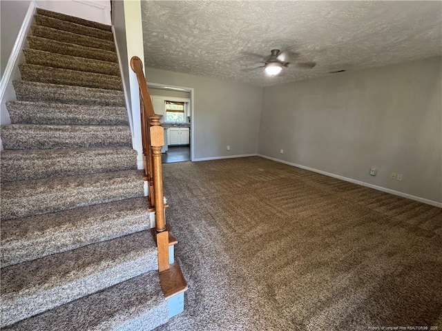 5870 Mcdonald Rd, Parkton, NC 28371 - staircase with baseboards, a ceiling fan, carpet, and a textured ceiling