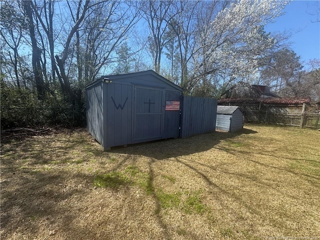 5870 Mcdonald Rd, Parkton, NC 28371 - view of shed with a fenced backyard