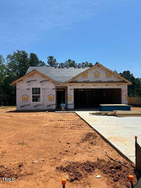 65 Crow Field St, Roxboro, NC 27574 - property under construction with a garage and concrete driveway