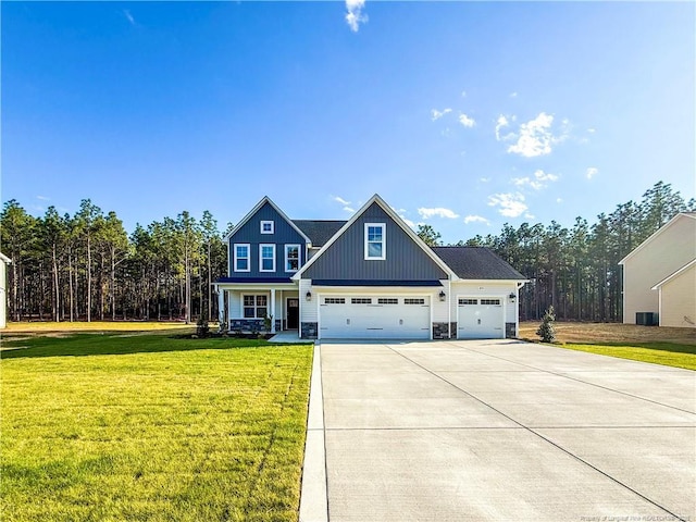 1312 Cory Cir, Fayetteville, NC 28312 - craftsman inspired home featuring board and batten siding, a front lawn, concrete driveway, an attached garage, and stone siding