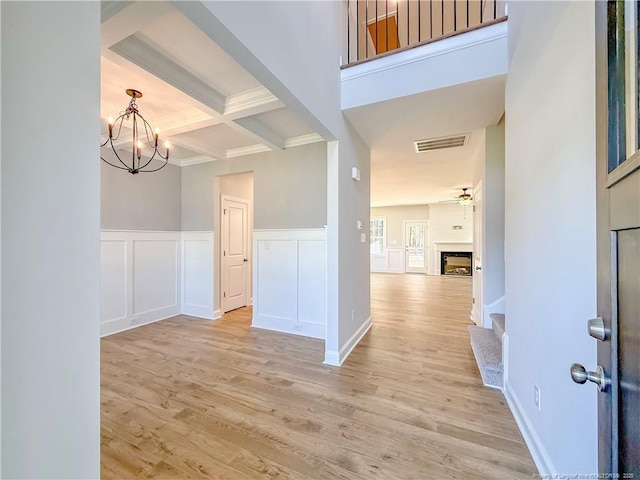 1312 Cory Cir, Fayetteville, NC 28312 - entryway featuring visible vents, beam ceiling, light wood finished floors, and coffered ceiling