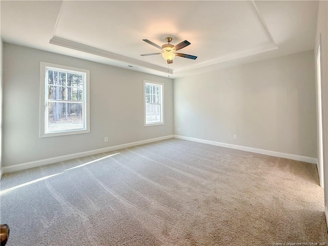 1312 Cory Cir, Fayetteville, NC 28312 - unfurnished room with a tray ceiling, ceiling fan, baseboards, and carpet