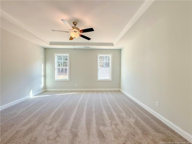 1312 Cory Cir, Fayetteville, NC 28312 - carpeted empty room with crown molding, a ceiling fan, a raised ceiling, and baseboards
