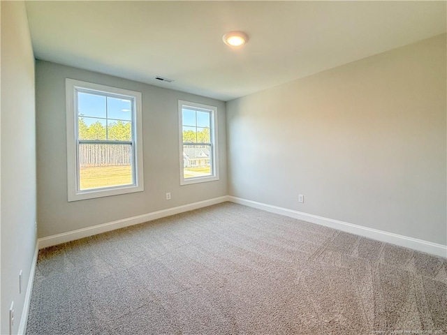 1312 Cory Cir, Fayetteville, NC 28312 - carpeted empty room with baseboards and visible vents