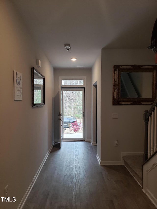 17 Verona Dr, Clayton, NC 27527 - doorway to outside with dark wood-type flooring, baseboards, and stairs