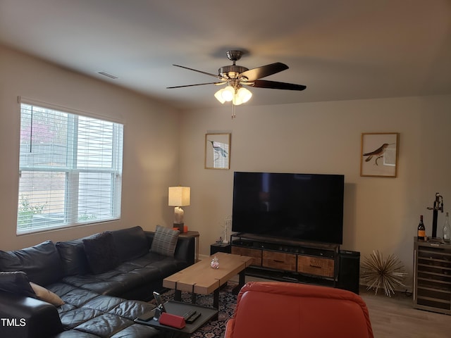 17 Verona Dr, Clayton, NC 27527 - living room with visible vents, ceiling fan, beverage cooler, and wood finished floors