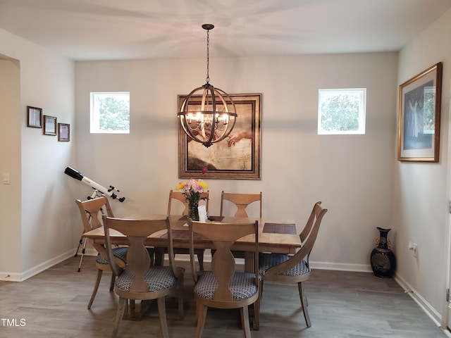17 Verona Dr, Clayton, NC 27527 - dining space with wood finished floors, an inviting chandelier, and baseboards