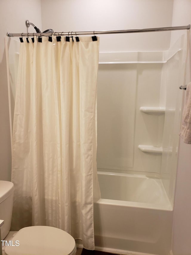 17 Verona Dr, Clayton, NC 27527 - bathroom featuring toilet and shower / bathtub combination with curtain
