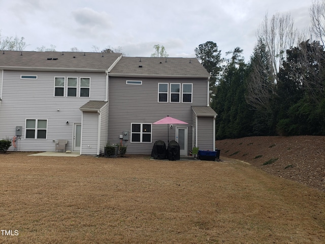 17 Verona Dr, Clayton, NC 27527 - rear view of house with a patio area, central AC unit, and a lawn