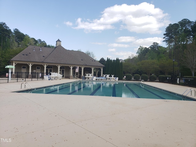 17 Verona Dr, Clayton, NC 27527 - community pool with a patio and fence