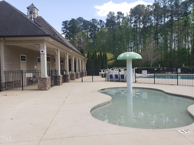 17 Verona Dr, Clayton, NC 27527 - pool featuring a patio area and fence
