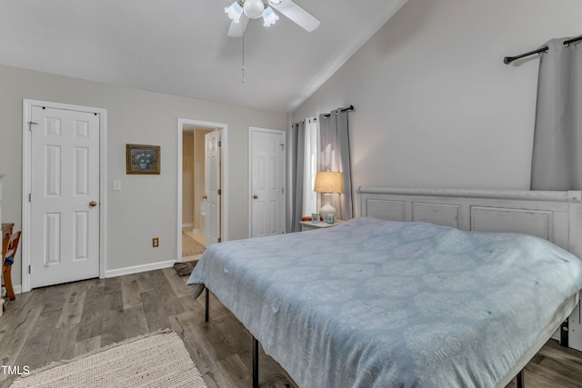 9512 Anson Grove Ln, Raleigh, NC 27615 - bedroom with vaulted ceiling, wood finished floors, ensuite bath, baseboards, and ceiling fan