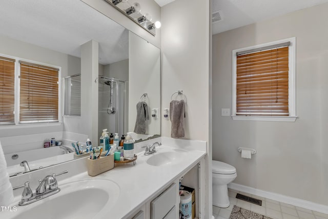 9512 Anson Grove Ln, Raleigh, NC 27615 - bathroom with a sink, baseboards, a shower with shower door, and visible vents