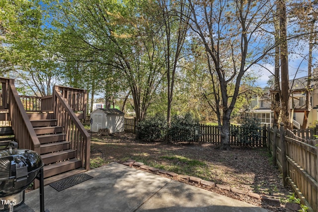9512 Anson Grove Ln, Raleigh, NC 27615 - view of yard featuring a patio, an outbuilding, a storage unit, and a fenced backyard